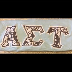 Alpha Sigma Tau letters